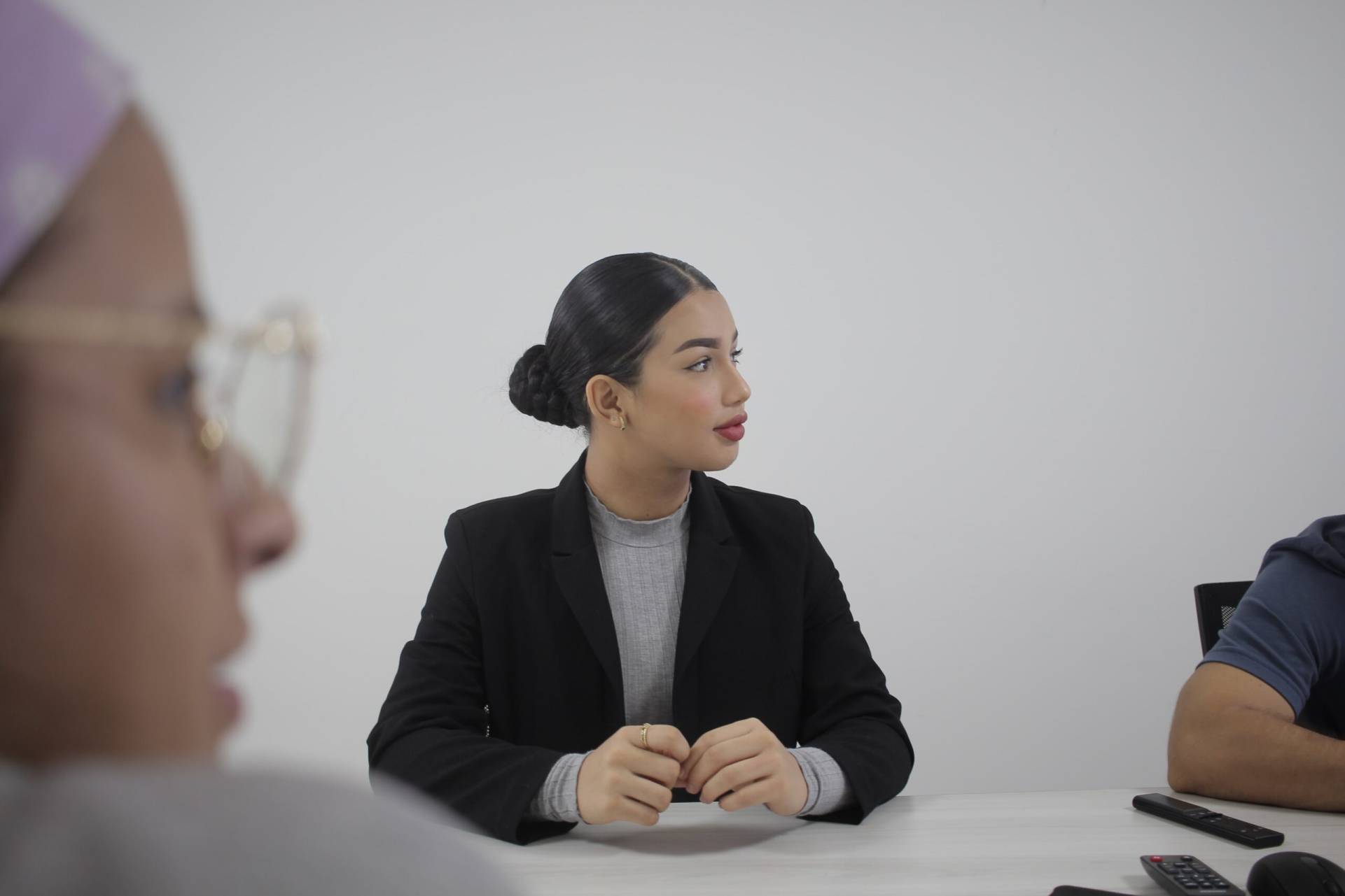 Woman in boardroom Woman looking to the right